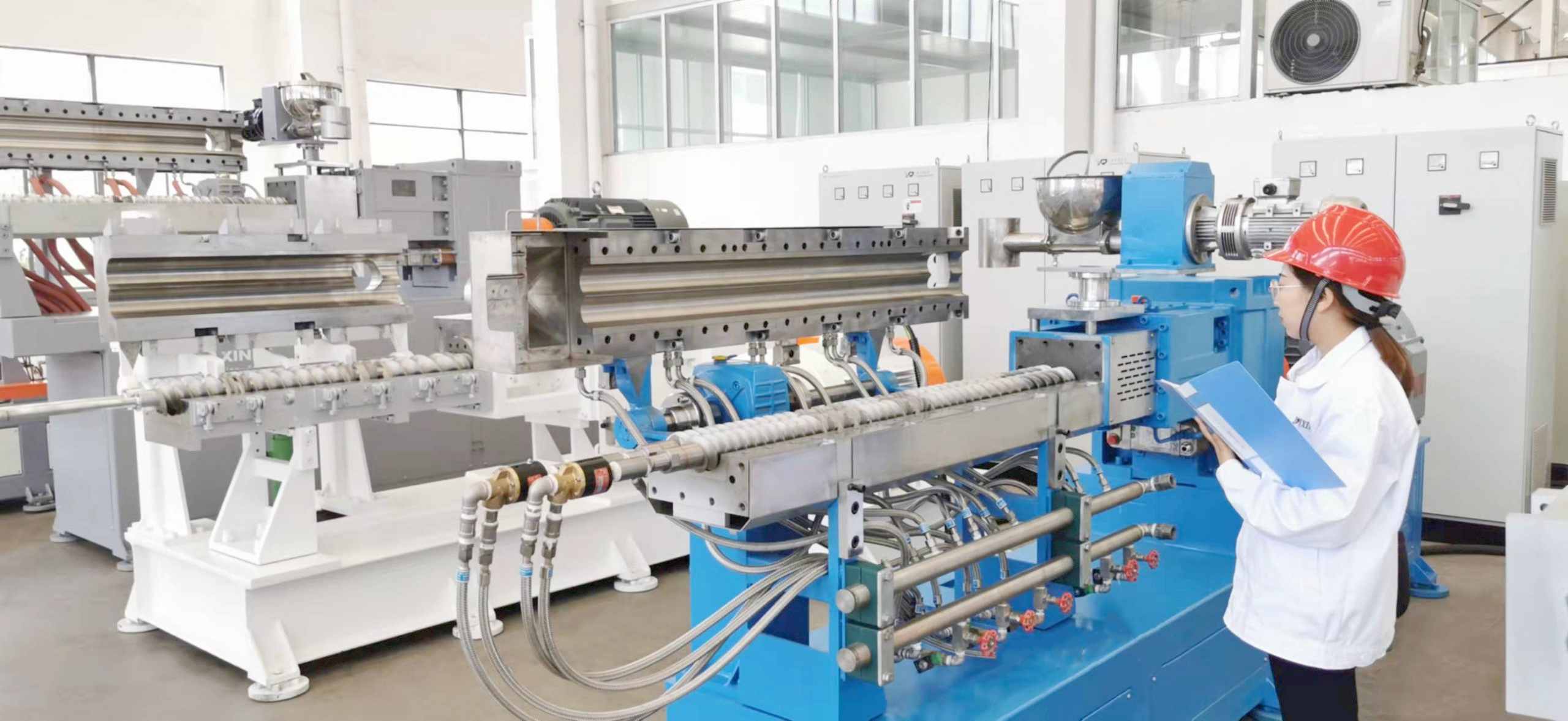 Twin screw extruder_clam shell barrel type